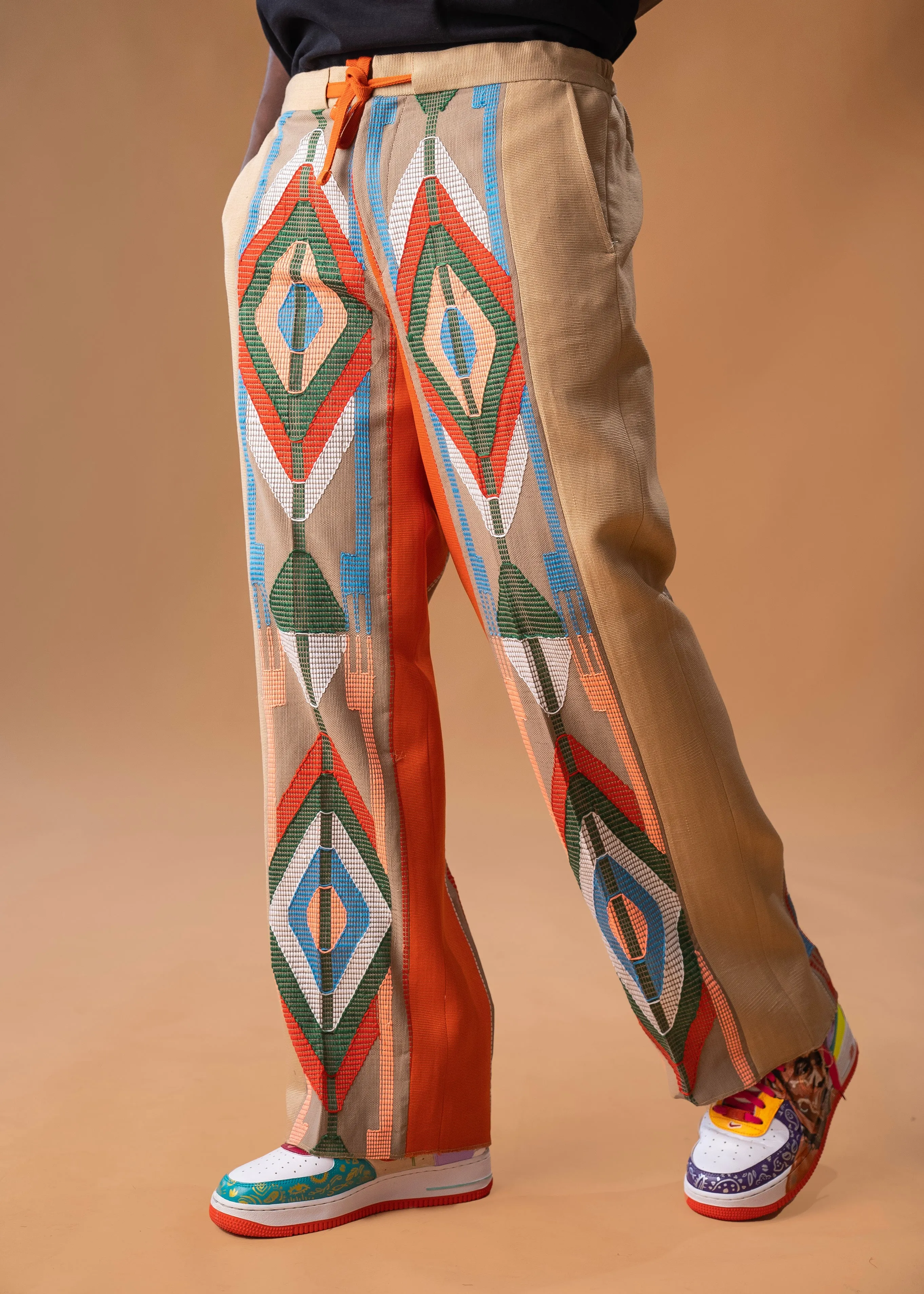 Wide-leg trousers in Aso oke and Akwete